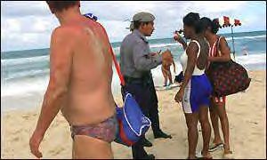 Cuban Police  reminding black Cubans they are not welcome. Tourists only.