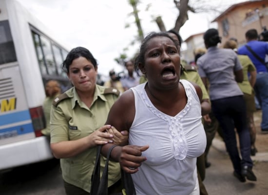 Lady in White is arrested the day Barack Obama, US president arrived in Cuba (Photo: Reuters)