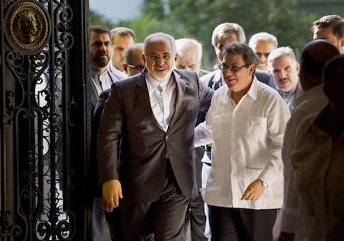 Iranian Foreign Minister Mohammad Javad Zarif, left, is welcomed by Cuban Foreign Minister Bruno Rodriguez, in Havana, Cuba, Monday, Aug. 22, 2016. Iran’s foreign minister begun a Latin American tour in Cuba, declaring Iran and Cuba united by their histories of resisting what he called U.S. atrocities. Zarif also plans to visit Nicaragua, Ecuador, Chile, Bolivia and Venezuela. (AP Photo/Ramon Espinosa)